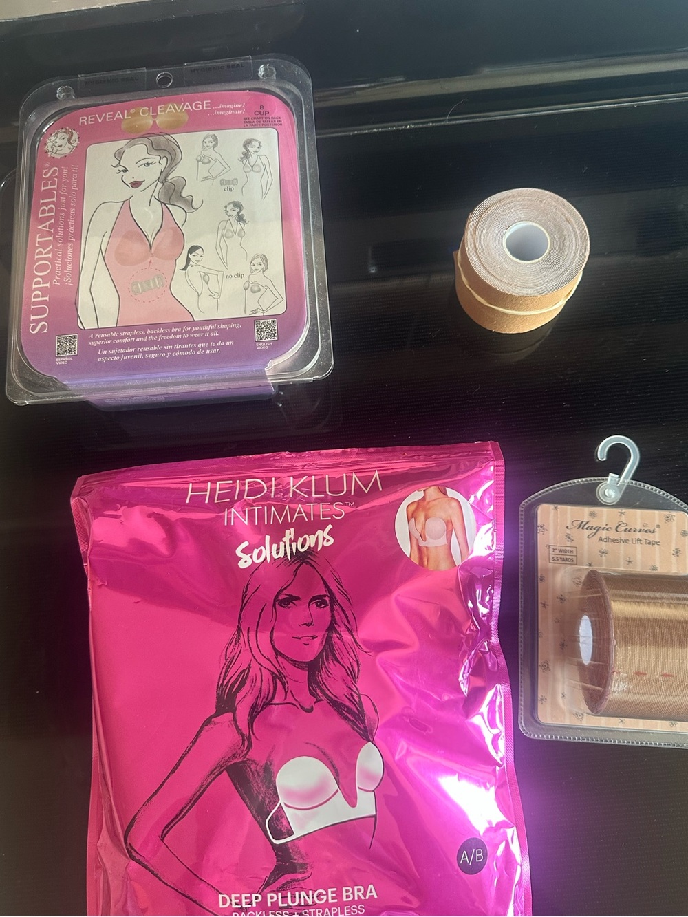 Two self adhesive bras and body tape